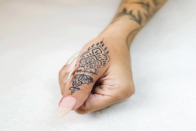 Why Choose a Thumb Tattoo?