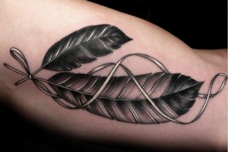 The Symbolism Behind Feather Tattoos